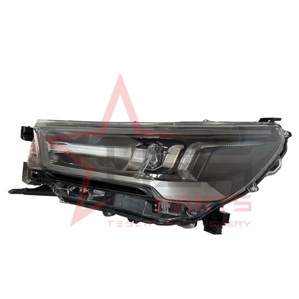 2021-2024 Toyota Hilux Revo Sol Far (Mercekli/İçi Koyu Gri/Krom Mercek)/(Hilux Yazılı-Invincible) 81150-YP080