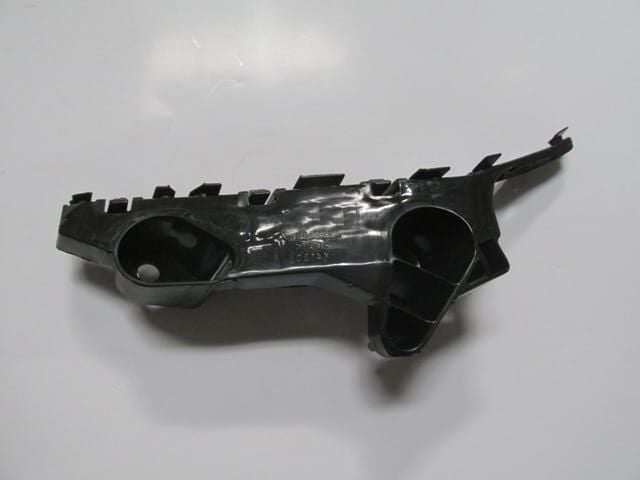 MAZDA 3- SD/HB- 14/16; ÖN TAMPON BRAKETİ SOL (PLASTİK) (TYG)